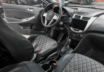 Подержанный автомобиль Hyundai Solaris Hatchback 2013 года (11 фото)