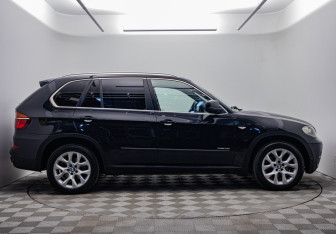 Подержанный автомобиль BMW X5 2011 года (6 фото)