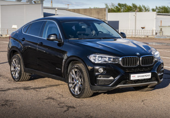 Подержанный автомобиль BMW X6 2015 года (3 фото)