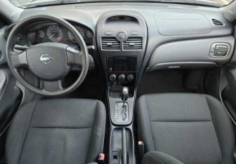 Подержанный автомобиль Nissan Almera Classic 2008 года (9 фото)