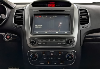 Подержанный автомобиль Kia Sorento 2016 года (17 фото)