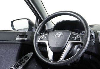 Подержанный автомобиль Hyundai Solaris Sedan 2014 года (13 фото)