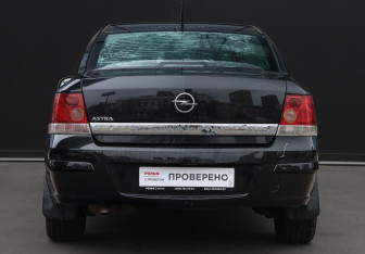 Подержанный автомобиль Opel Astra Sedan 2014 года (6 фото)