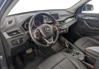 Подержанный автомобиль BMW X1 2018 года (16 фото)