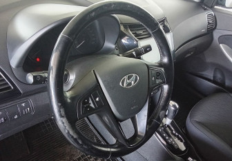 Подержанный автомобиль Hyundai Solaris Sedan 2014 года (12 фото)