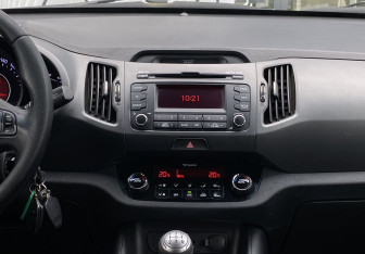 Подержанный автомобиль Kia Sportage 2011 года (12 фото)