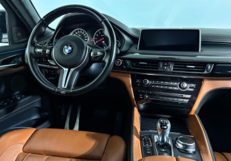 Подержанный автомобиль BMW X6 M 2016 года (15 фото)
