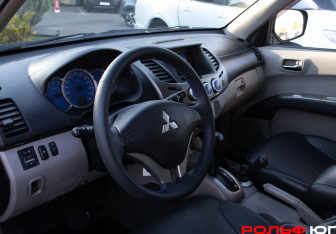 Подержанный автомобиль Mitsubishi L200 2008 года (10 фото)