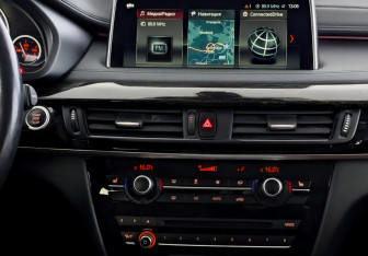 Подержанный автомобиль BMW X6 2018 года (15 фото)