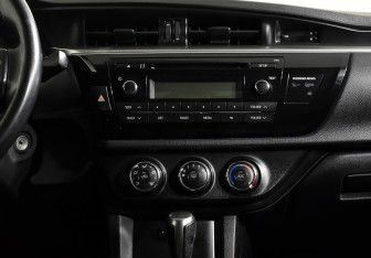 Подержанный автомобиль Toyota Corolla Sedan 2014 года (13 фото)