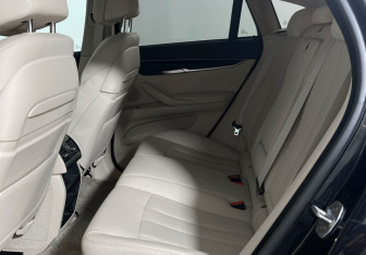 Подержанный автомобиль BMW X6 2015 года (14 фото)