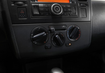 Подержанный автомобиль Nissan Tiida Sedan 2011 года (18 фото)