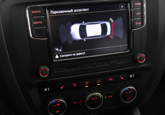 Подержанный автомобиль Volkswagen Jetta Sedan 2012 года (13 фото)