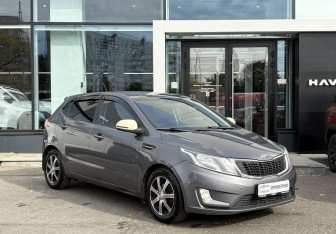 Подержанный автомобиль Kia Rio Hatchback 2013 года (3 фото)