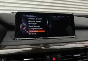 Подержанный автомобиль BMW X6 2016 года (21 фото)