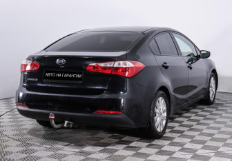 Подержанный автомобиль Kia Cerato Sedan 2013 года (5 фото)