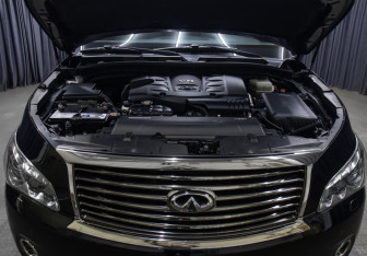 Подержанный автомобиль Infiniti QX56 2011 года (9 фото)