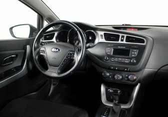 Подержанный автомобиль Kia Ceed Hatchback 2014 года (6 фото)