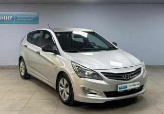 Подержанный автомобиль Hyundai Solaris Hatchback 2014 года (3 фото)