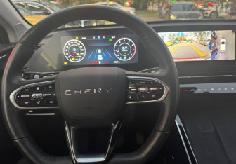 Подержанный автомобиль Omoda C5 2023 года (10 фото)