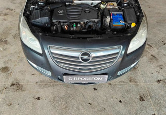 Подержанный автомобиль Opel Insignia Wagon 2011 года (16 фото)