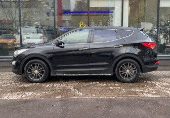 Подержанный автомобиль Hyundai Santa Fe 2013 года (5 фото)