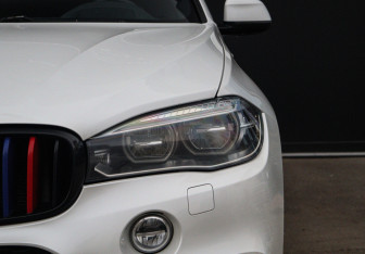 Подержанный автомобиль BMW X6 2016 года (27 фото)