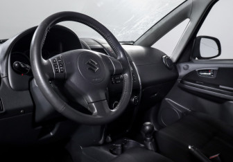 Подержанный автомобиль Suzuki SX4 Sedan 2010 года (14 фото)