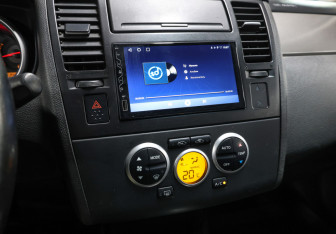 Подержанный автомобиль Nissan Tiida Hatchback 2008 года (18 фото)