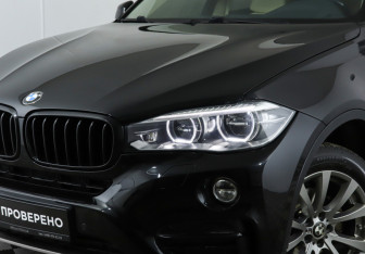Подержанный автомобиль BMW X6 2015 года (24 фото)