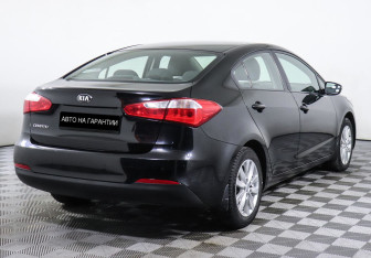 Подержанный автомобиль Kia Cerato Sedan 2014 года (3 фото)