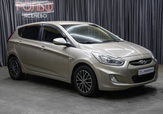 Подержанный автомобиль Hyundai Solaris Hatchback 2013 года (3 фото)