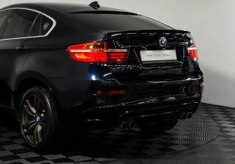 Подержанный автомобиль BMW X6 M 2012 года (22 фото)