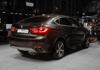 Подержанный автомобиль BMW X6 2016 года (4 фото)