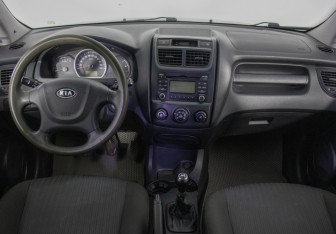 Подержанный автомобиль Kia Sportage 2009 года (13 фото)