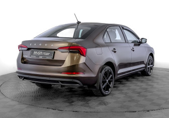 Подержанный автомобиль Skoda Rapid Liftback 2021 года (5 фото)