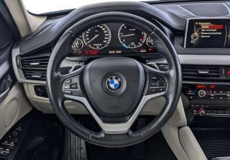 Подержанный автомобиль BMW X6 2015 года (22 фото)