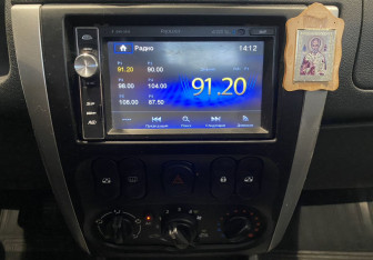 Подержанный автомобиль Nissan Almera Sedan 2014 года (13 фото)