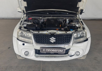 Подержанный автомобиль Suzuki Grand Vitara 2011 года (18 фото)