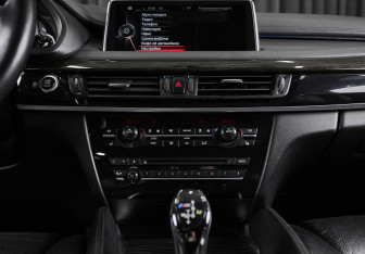 Подержанный автомобиль BMW X6 2014 года (18 фото)