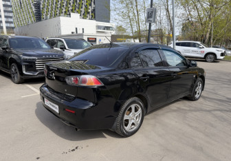 Подержанный автомобиль Mitsubishi Lancer Sedan 2011 года (5 фото)