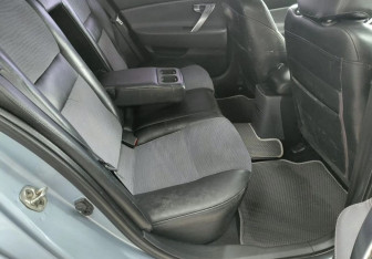 Подержанный автомобиль Nissan Primera Sedan 2006 года (16 фото)