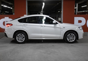 Подержанный автомобиль BMW X4 2017 года (4 фото)