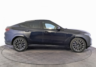Подержанный автомобиль BMW X6 2025 года (4 фото)