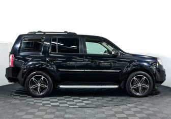 Подержанный автомобиль Honda Pilot 2013 года (4 фото)