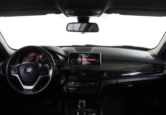 Подержанный автомобиль BMW X6 2016 года (12 фото)