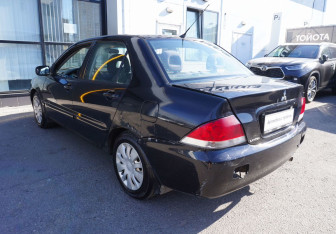 Подержанный автомобиль Mitsubishi Lancer Sedan 2006 года (7 фото)