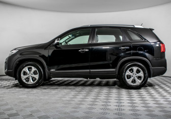 Подержанный автомобиль Kia Sorento 2014 года (8 фото)