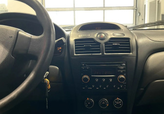Подержанный автомобиль Nissan Almera Classic 2008 года (14 фото)