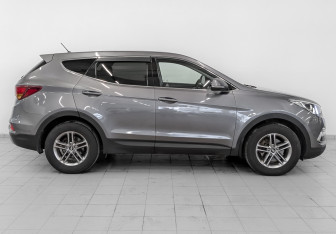 Подержанный автомобиль Hyundai Santa Fe 2016 года (4 фото)